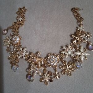 Kirks Folly Gold and Cream Charm  Snowflake Bracelet